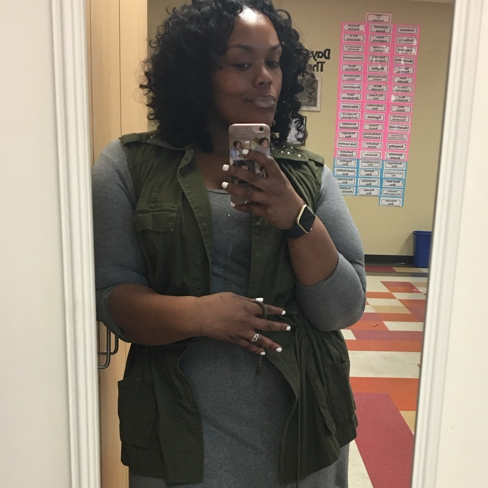 Green vest with grommet details!